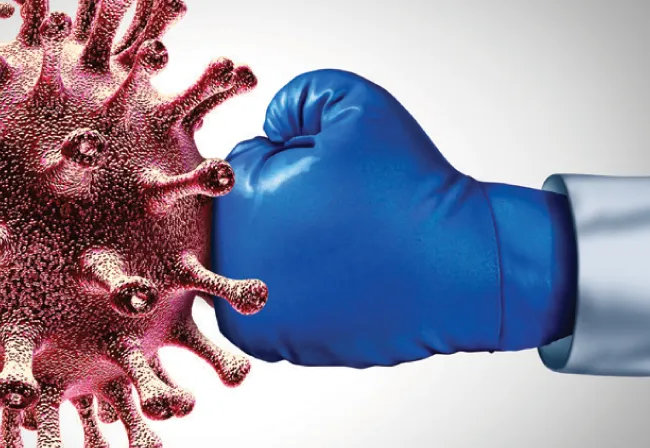 Conceptual image of a gloved fist confronting a pathogen, representing Scrubzone's disinfection technology